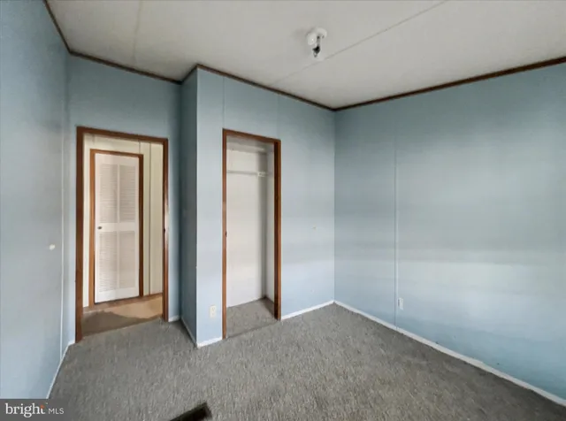 an empty room with closet