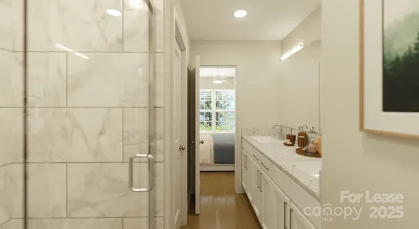 a bathroom with a double vanity sink a toilet and a mirror