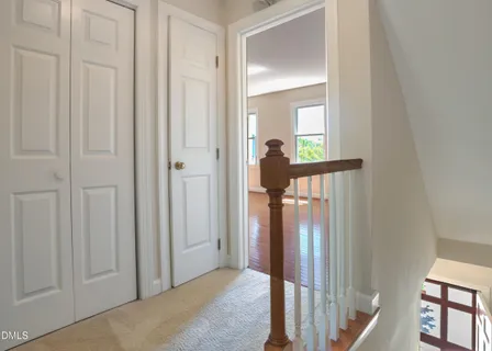 a view of a livingroom from a hallway