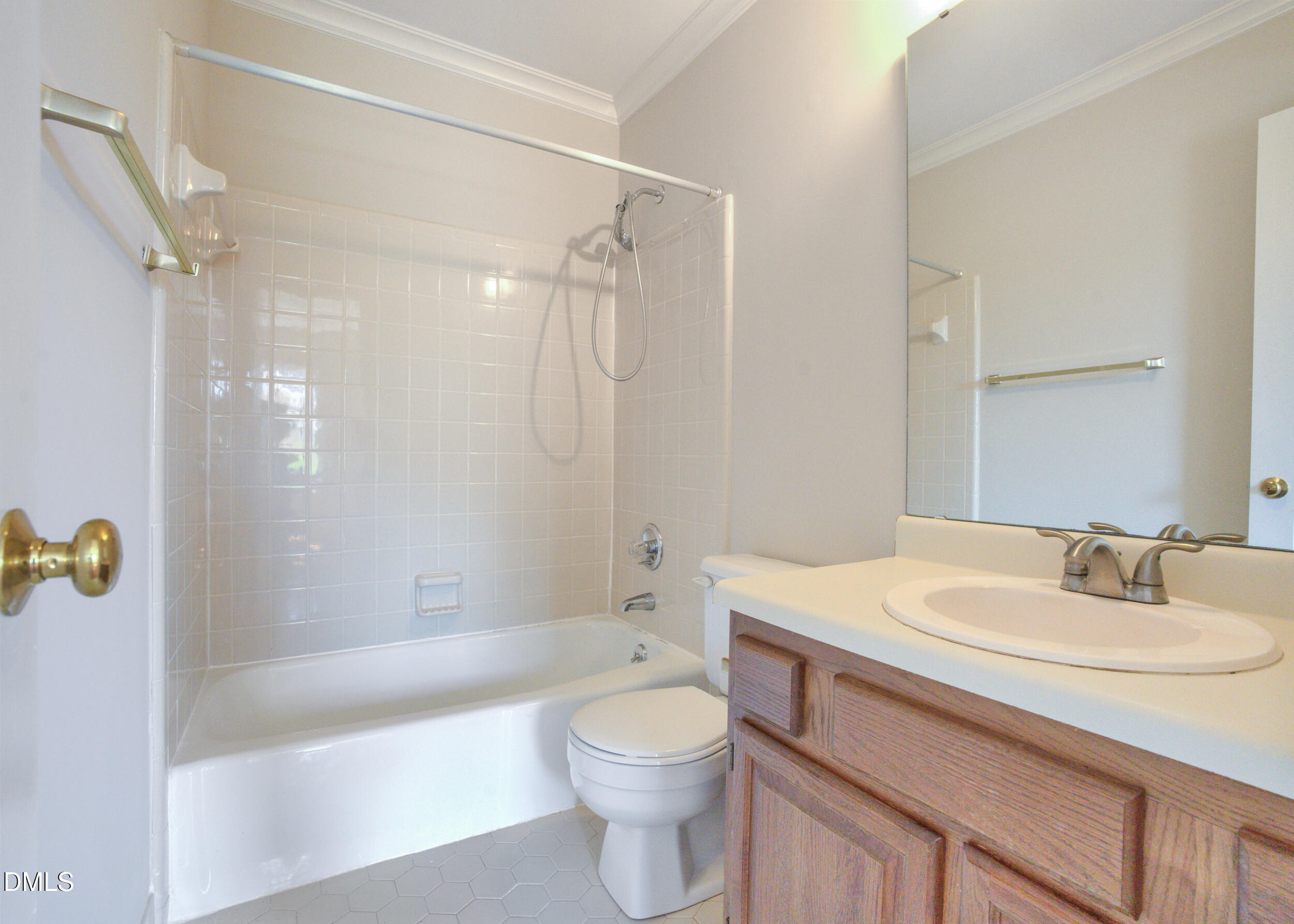 5018 Dunwoody Trail Raleigh, NC 27606 - Photo 14 of 24 a bathroom with a sink a toilet and shower