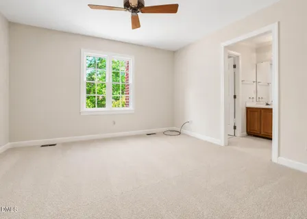 an empty room with a empty space and a window
