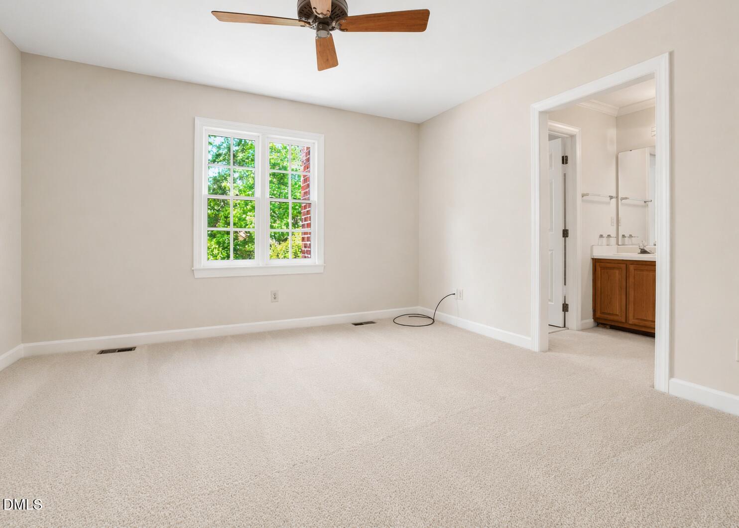 5018 Dunwoody Trail Raleigh, NC 27606 - Photo 16 of 24 an empty room with a empty space and a window