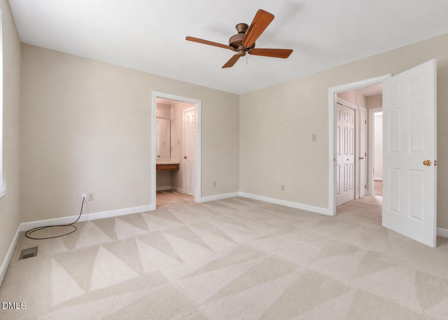 5018 Dunwoody Trail Raleigh, NC 27606 - Photo 17 of 24 a view of room with ceiling fan and window