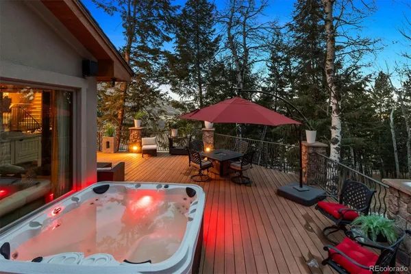 a bathroom with a sink a mirror and toilet