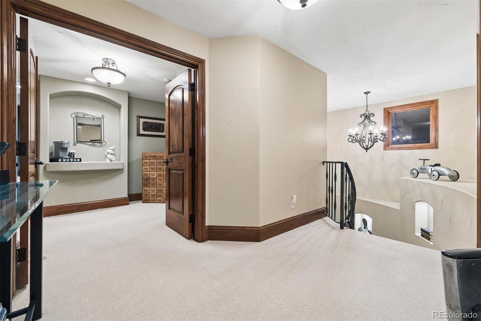 45 West Ranch Trail Morrison, CO 80465 - Photo 29 of 50 a view of a livingroom with furniture and bathroom