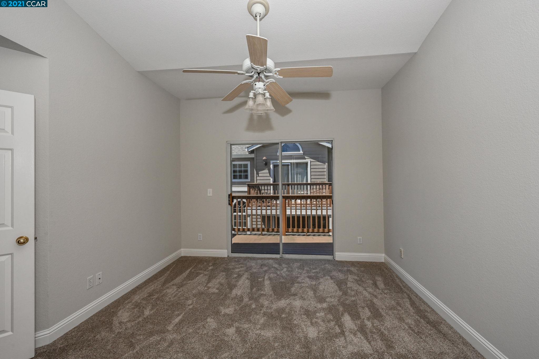 703 Destiny Lane San Ramon, CA 94583 - Photo 13 of 22 an empty room with chandelier fan