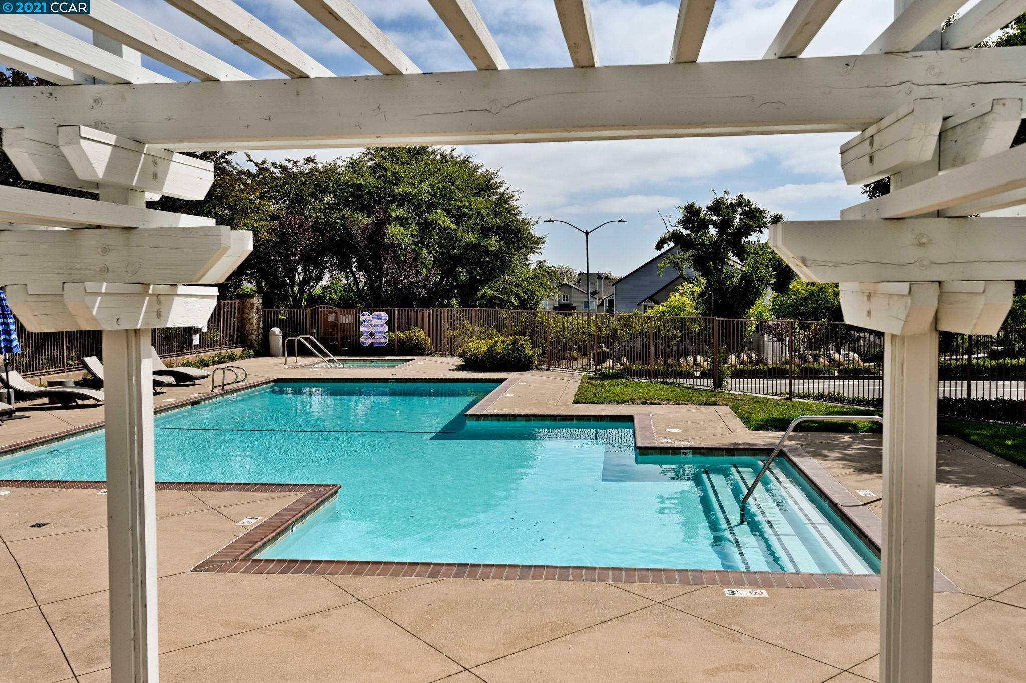 703 Destiny Lane San Ramon, CA 94583 - Photo 22 of 22 a view of a swimming pool with a patio
