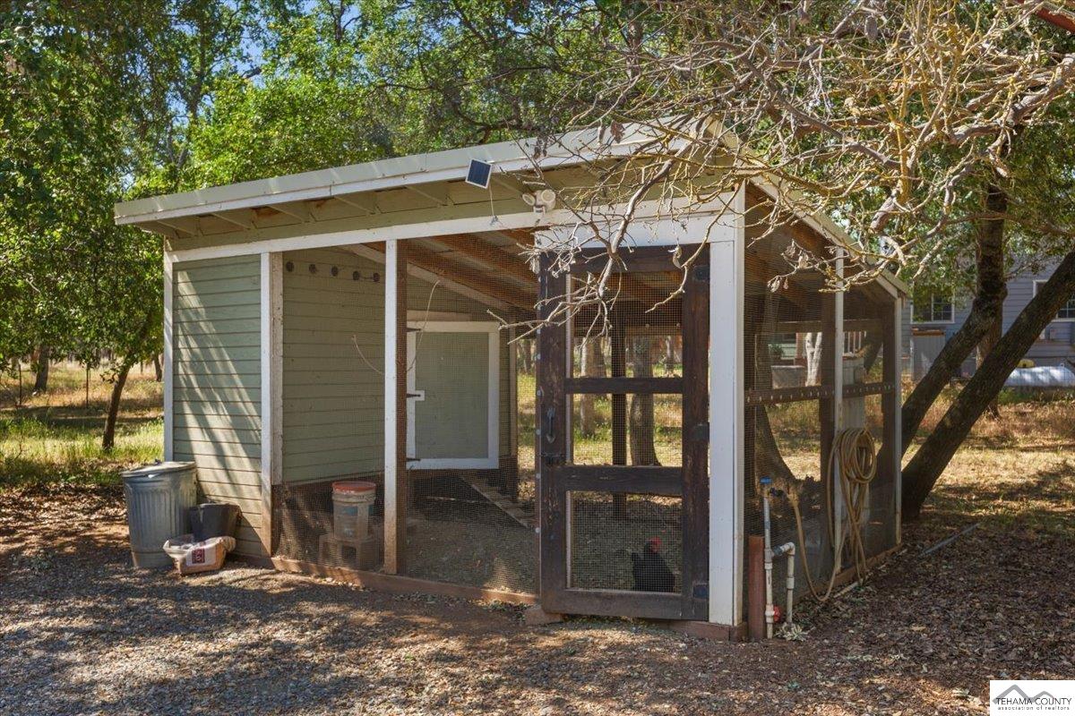 18887 Ridge Road Red Bluff, CA 96080 - Photo 39 of 48 a view of a house with a tree