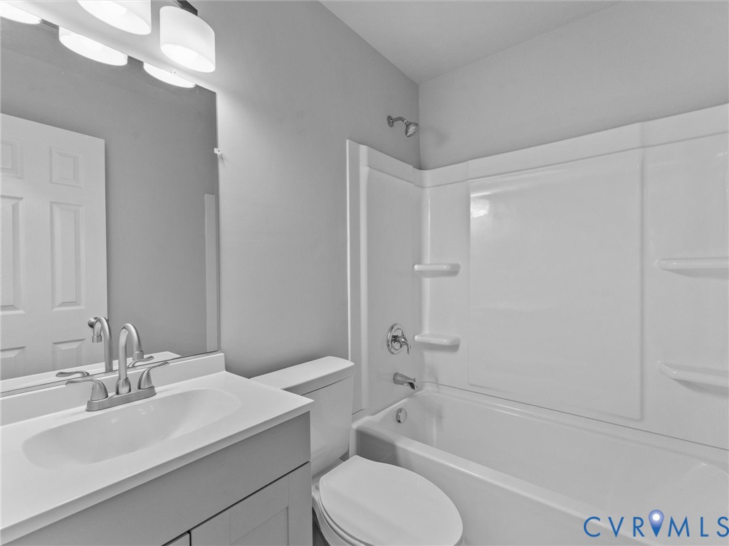 6204 Walderbrook Road Richmond, VA 23234 - Photo 19 of 32 Bathroom featuring a white vanity with integrated