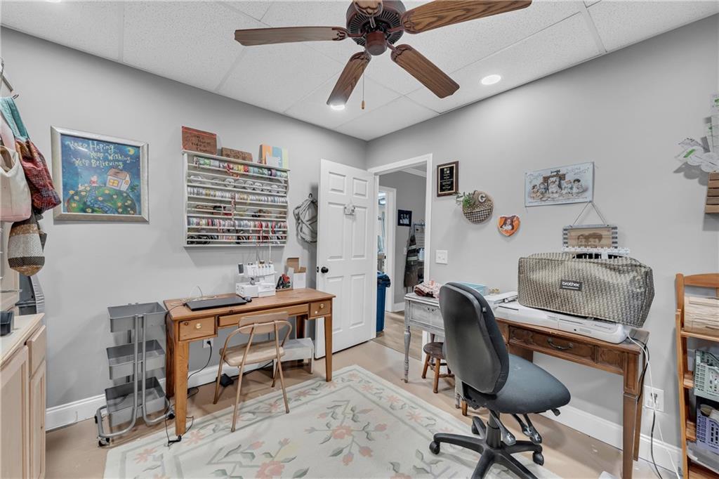 587-j B J B Owens Road Bethlehem, GA 30620 - Photo 66 of 99 a workspace with furniture and a window