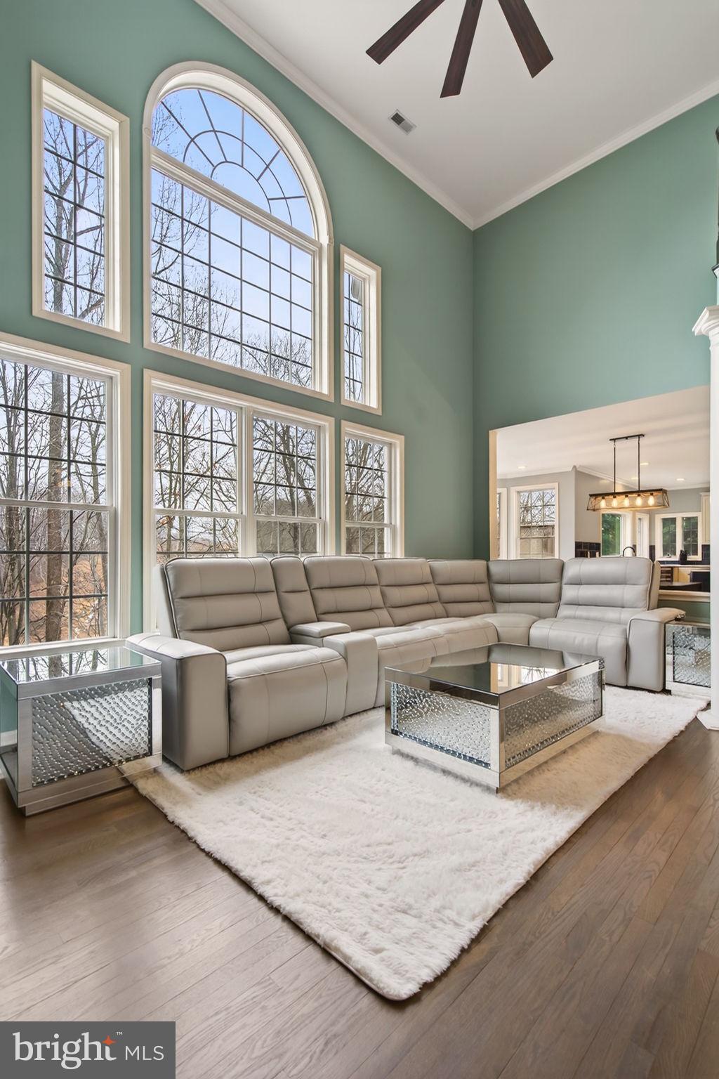 8020 Pohick Road Springfield, VA 22153 - Photo 12 of 57 a living room with furniture and a large window