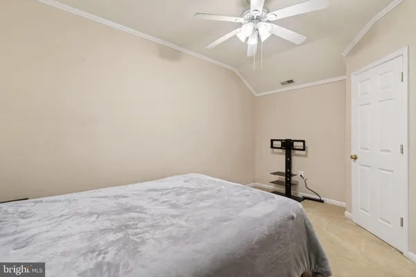 a large bathroom with a large tub sink vanity and granite