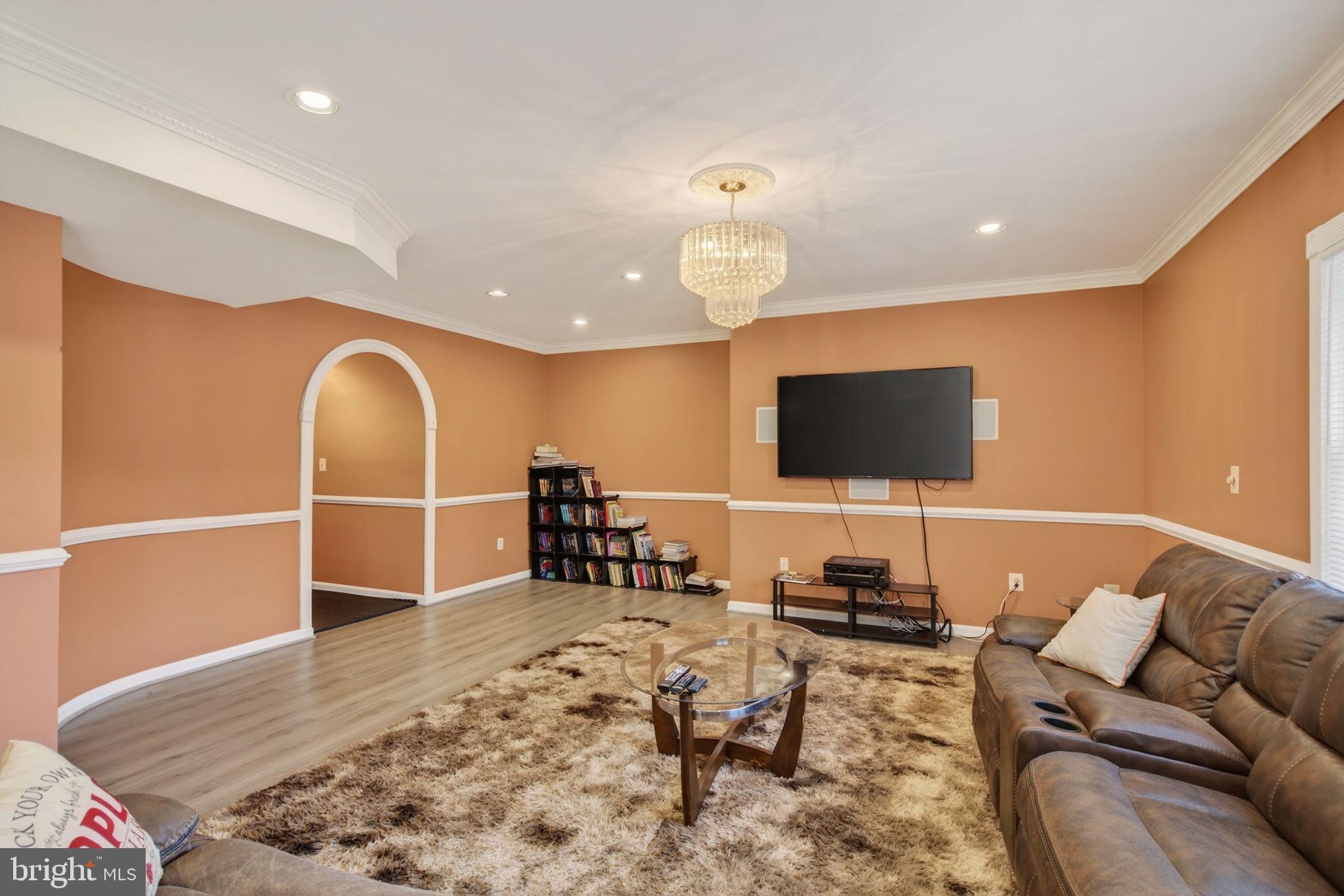 8020 Pohick Road Springfield, VA 22153 - Photo 36 of 57 a living room with furniture and a flat screen tv