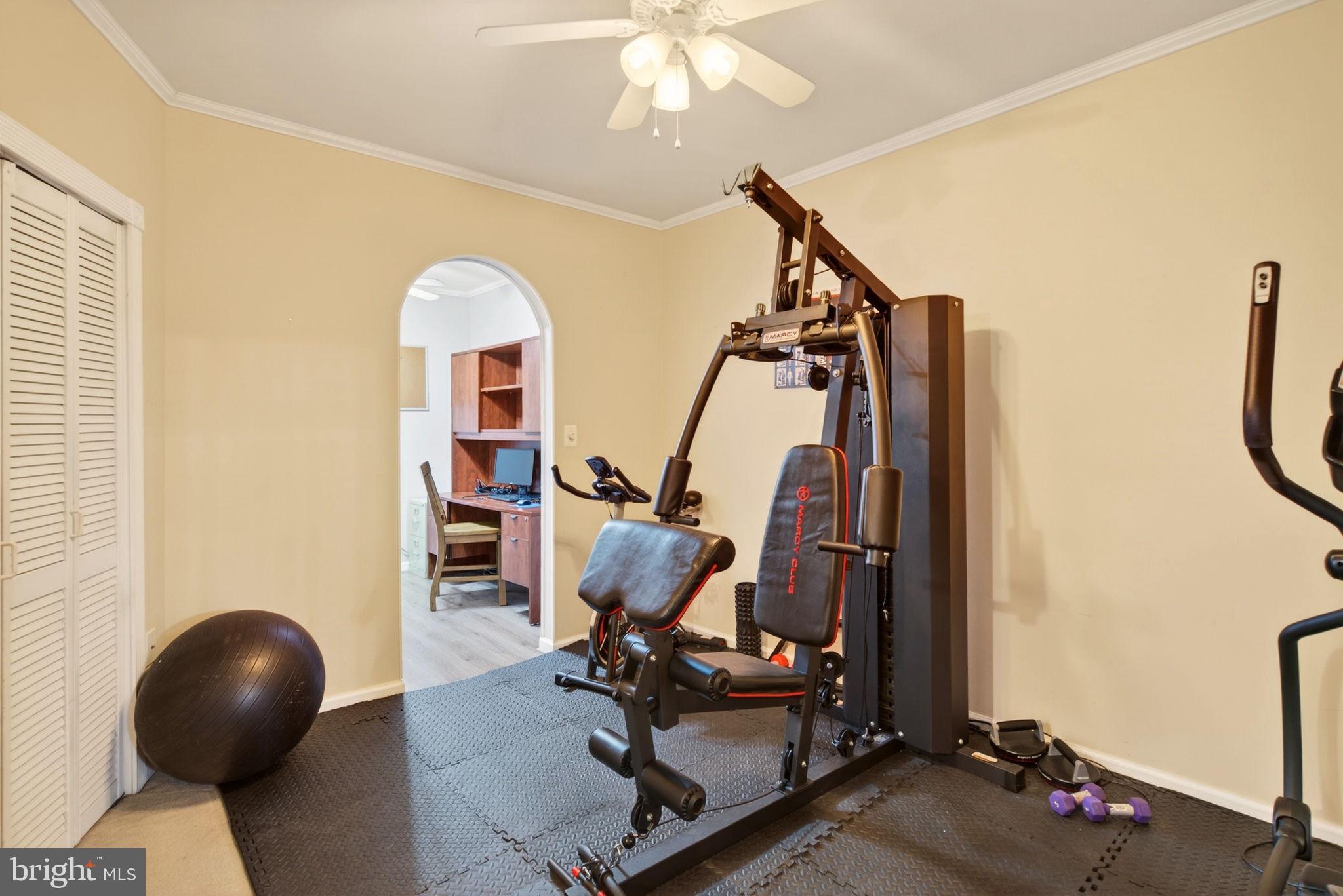 8020 Pohick Road Springfield, VA 22153 - Photo 41 of 57 a view of a workspace with furniture and gym equipment