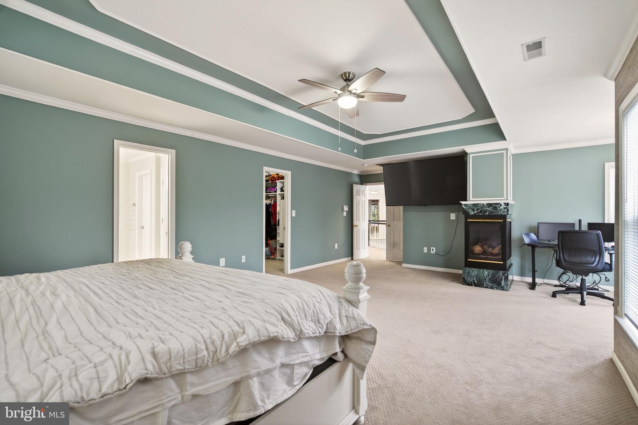 8020 Pohick Road Springfield, VA 22153 - Photo 49 of 57 a spacious bedroom with a bed and furniture