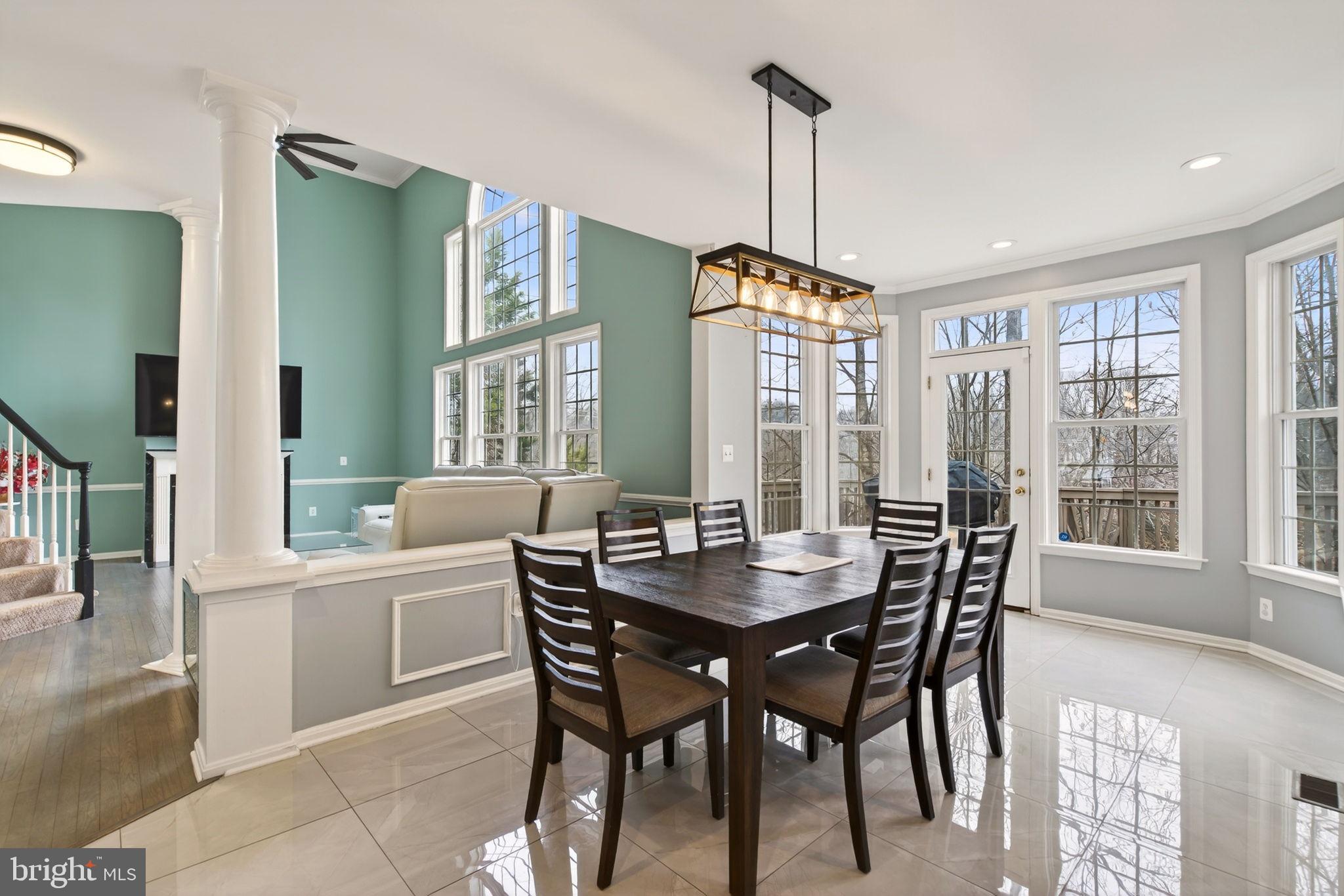 8020 Pohick Road Springfield, VA 22153 - Photo 51 of 57 a view of a dining room with furniture window and wooden floor