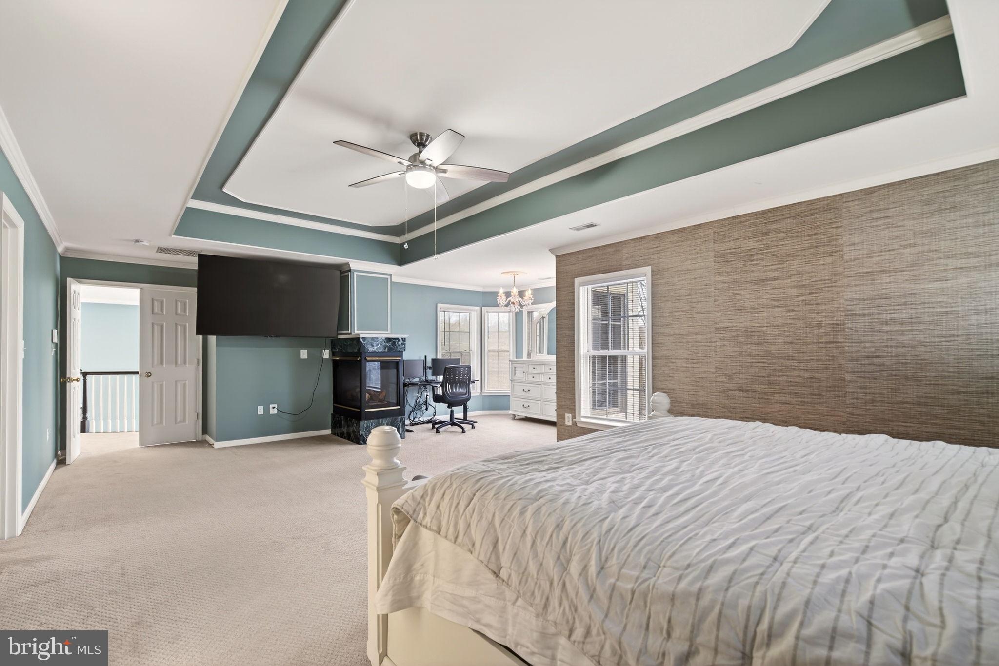 8020 Pohick Road Springfield, VA 22153 - Photo 52 of 57 a bedroom with a bed window and a flat screen tv