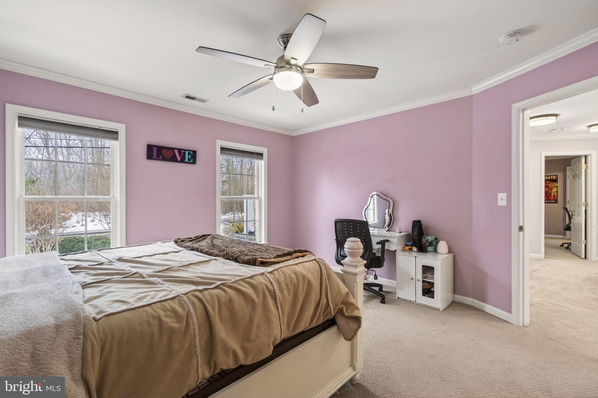 8020 Pohick Road Springfield, VA 22153 - Photo 53 of 57 a bedroom with a bed and a table