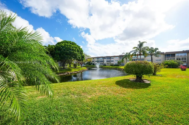 a bedroom with bed and a window