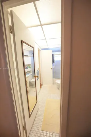 a flower pot with wooden floor