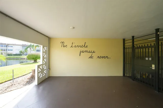 a bathroom with a tub and shower