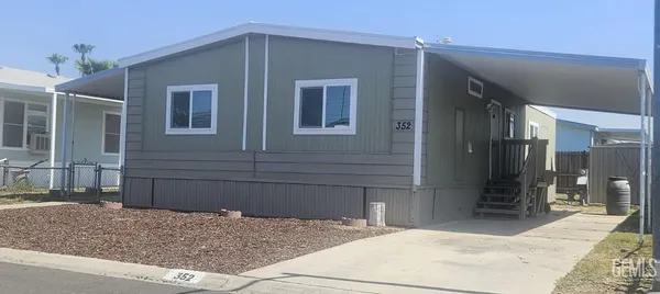 a house view with a outdoor space