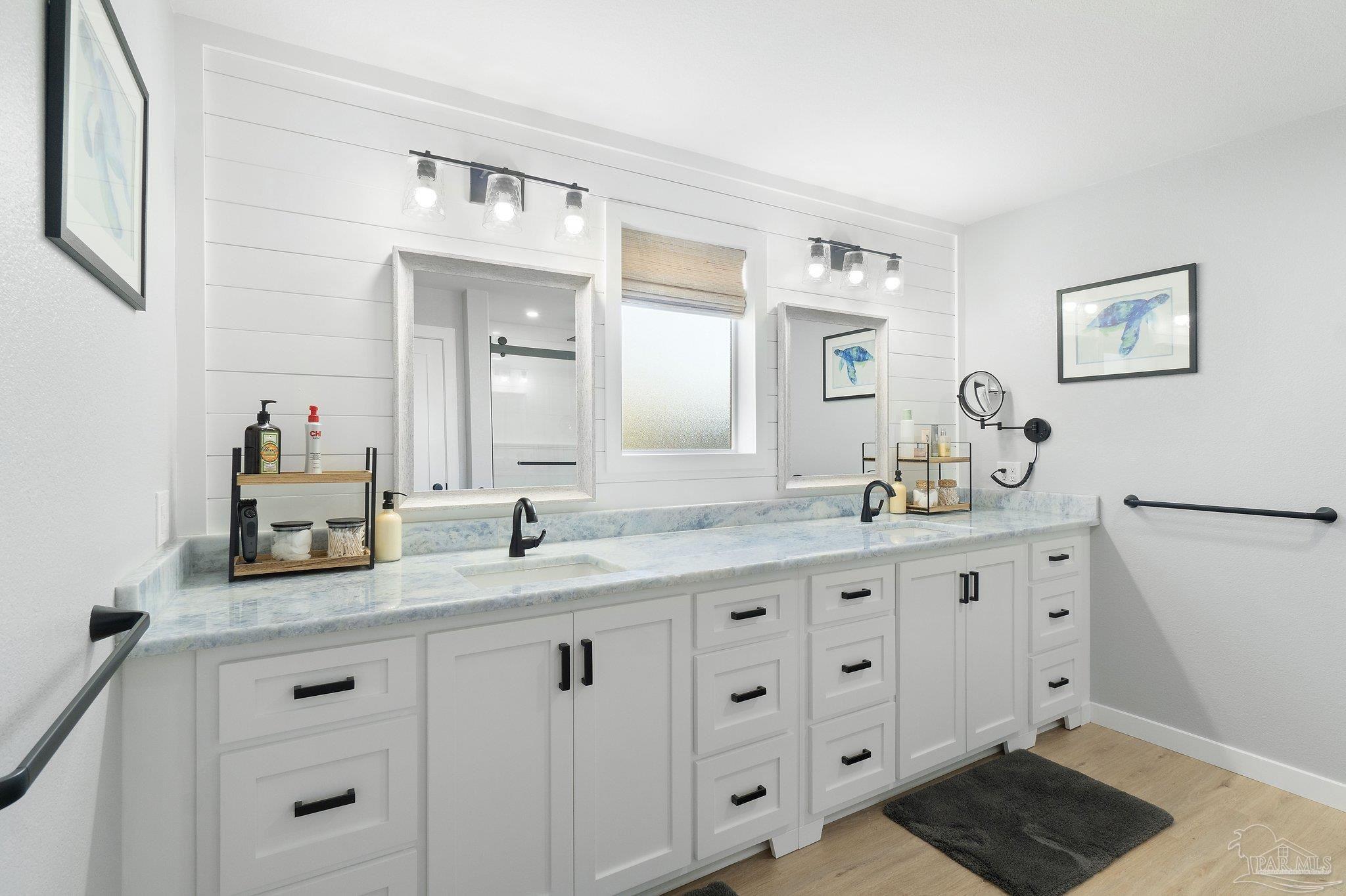 2016 Winners Circle Cantonment, FL 32533 - Photo 14 of 32 a bathroom with a granite countertop double vanity sink mirror and