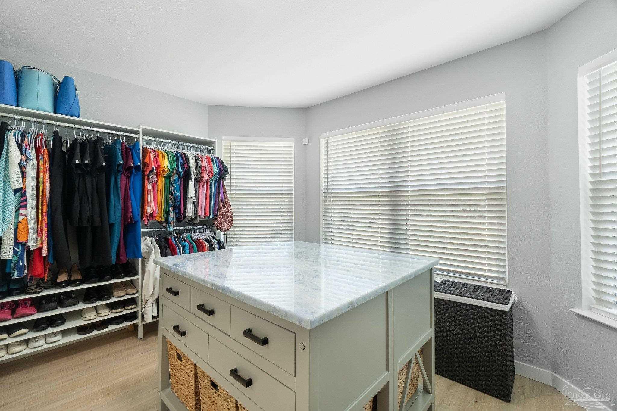 2016 Winners Circle Cantonment, FL 32533 - Photo 18 of 32 wooden floor with a window and a kitchen