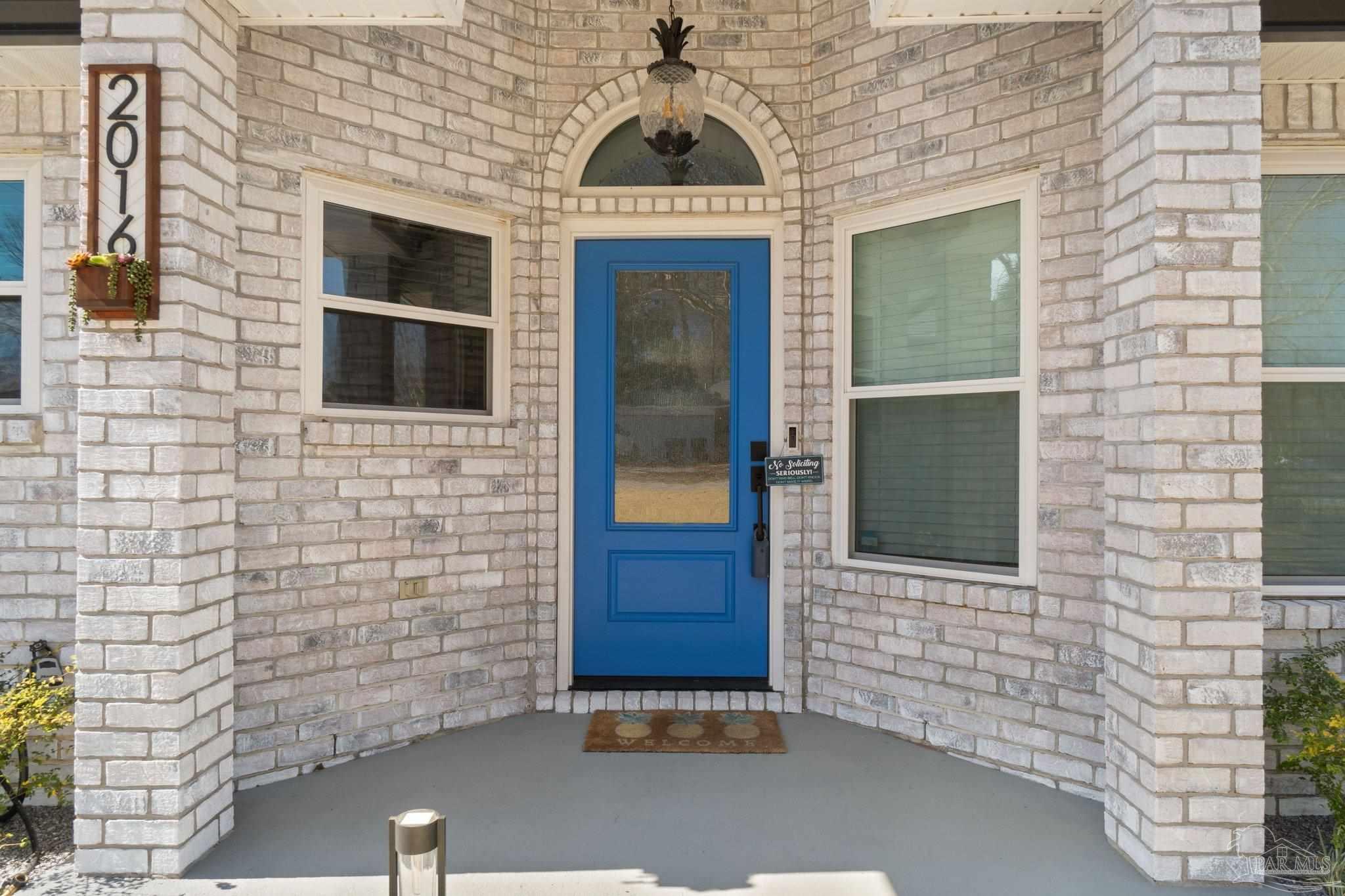 2016 Winners Circle Cantonment, FL 32533 - Photo 4 of 32 a view of front door of house