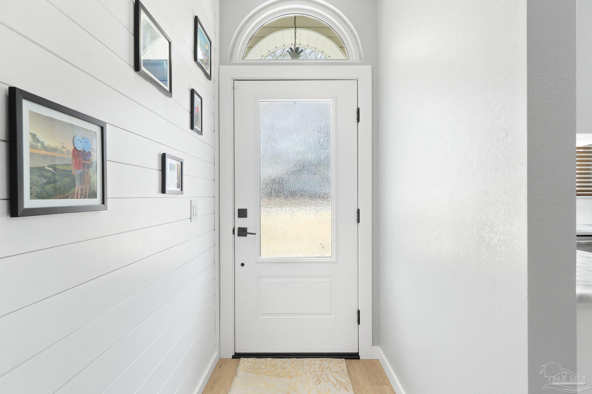2016 Winners Circle Cantonment, FL 32533 - Photo 5 of 32 a view of a door with a hallway