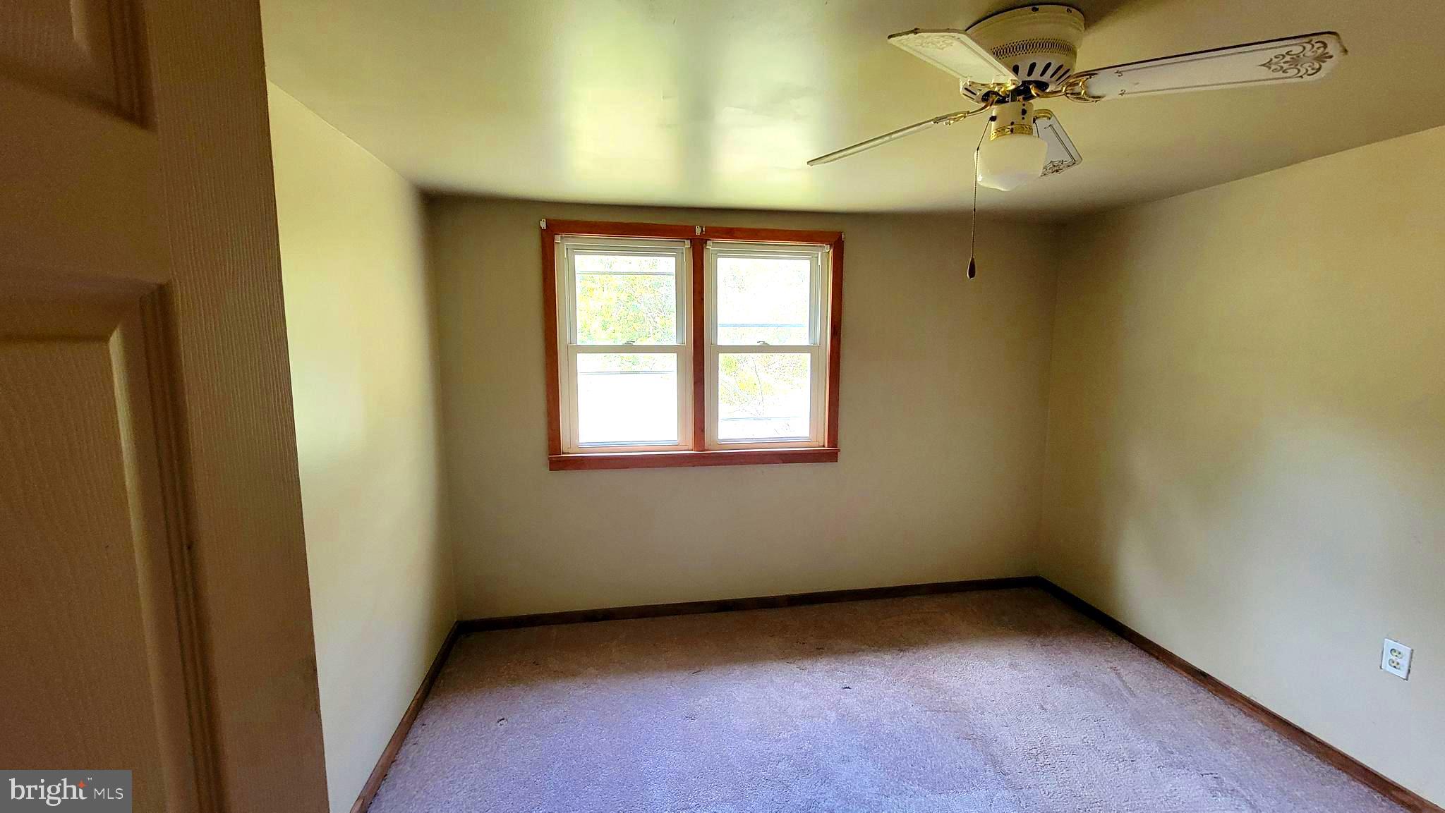 12809 Walsh Road Mount Savage, MD 21545 - Photo 29 of 30 a view of an empty room with a window