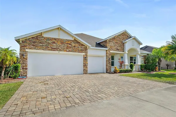 a view of a lake with houses in the background