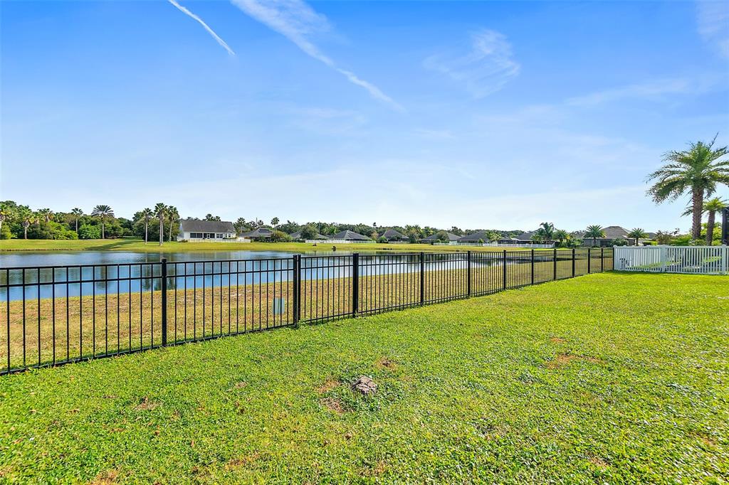 39 Turtle Ridge Drive Flagler Beach, FL 32136 - Photo 18 of 58 a view of outdoor space with swimming pool and green space