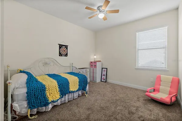a view of a kitchen with furniture and a window