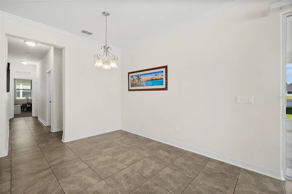 a living room with furniture and natural light