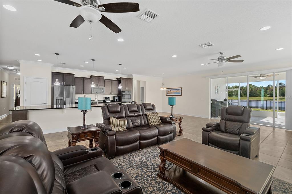 39 Turtle Ridge Drive Flagler Beach, FL 32136 - Photo 41 of 58 a living room with furniture and a large window