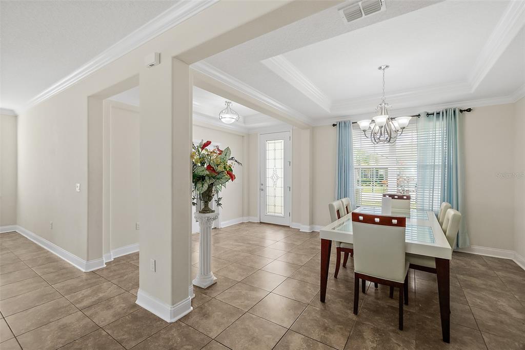 39 Turtle Ridge Drive Flagler Beach, FL 32136 - Photo 46 of 58 a dining room with furniture and window