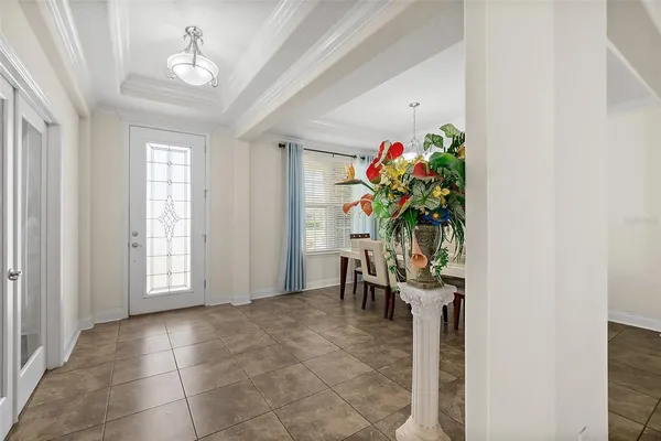 a view of a livingroom with furniture and windows