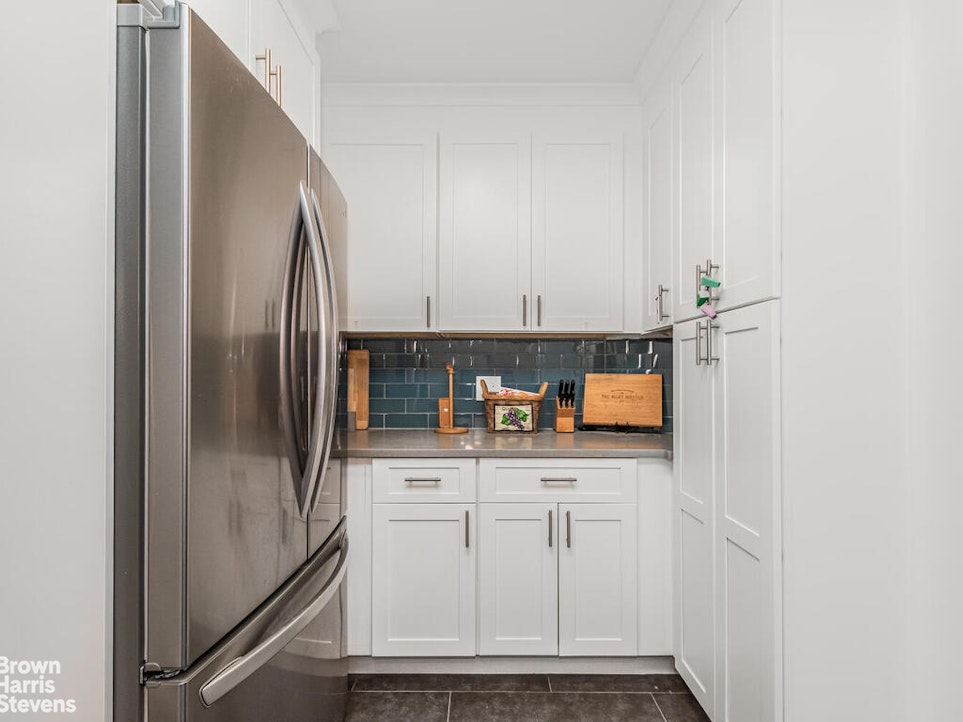 3777 Independence Avenue, Unit 4D Bronx, NY 10463 - Photo 12 of 29 a kitchen with stainless steel appliances a refrigerator and a sink