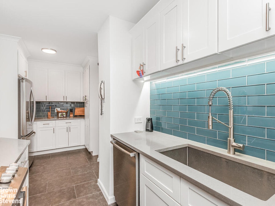 3777 Independence Avenue, Unit 4D Bronx, NY 10463 - Photo 14 of 29 a kitchen with a sink and refrigerator