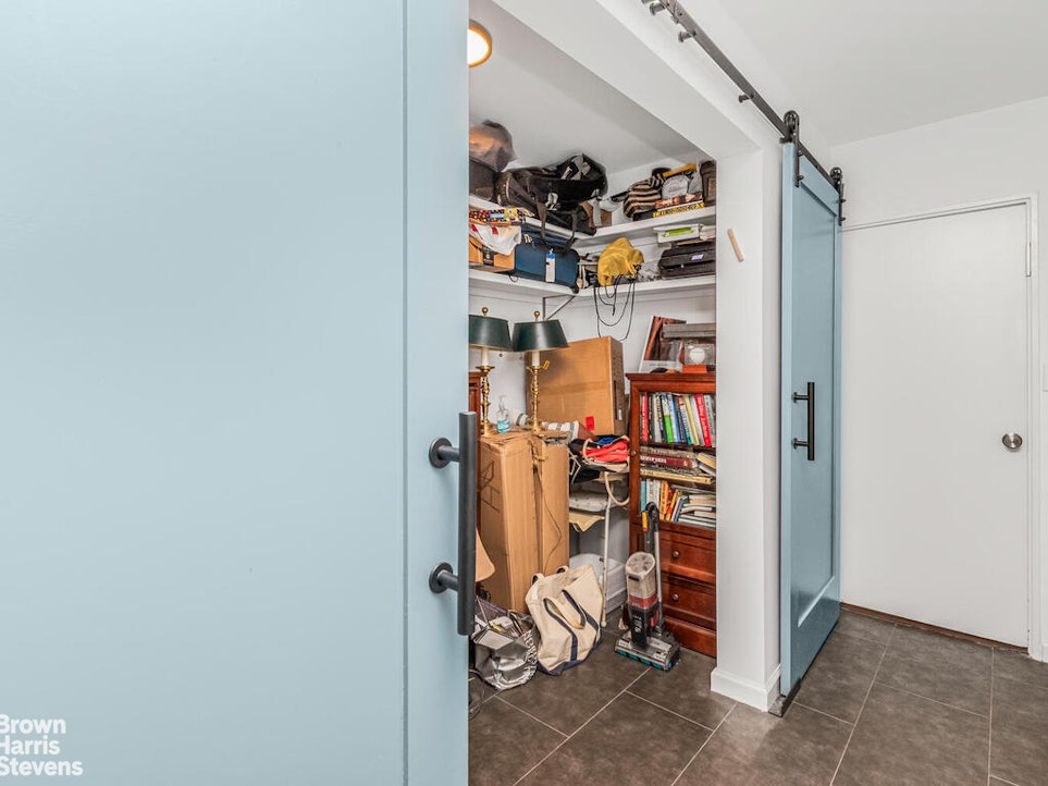 3777 Independence Avenue, Unit 4D Bronx, NY 10463 - Photo 17 of 29 a view of walk in closet with clothes and shoes