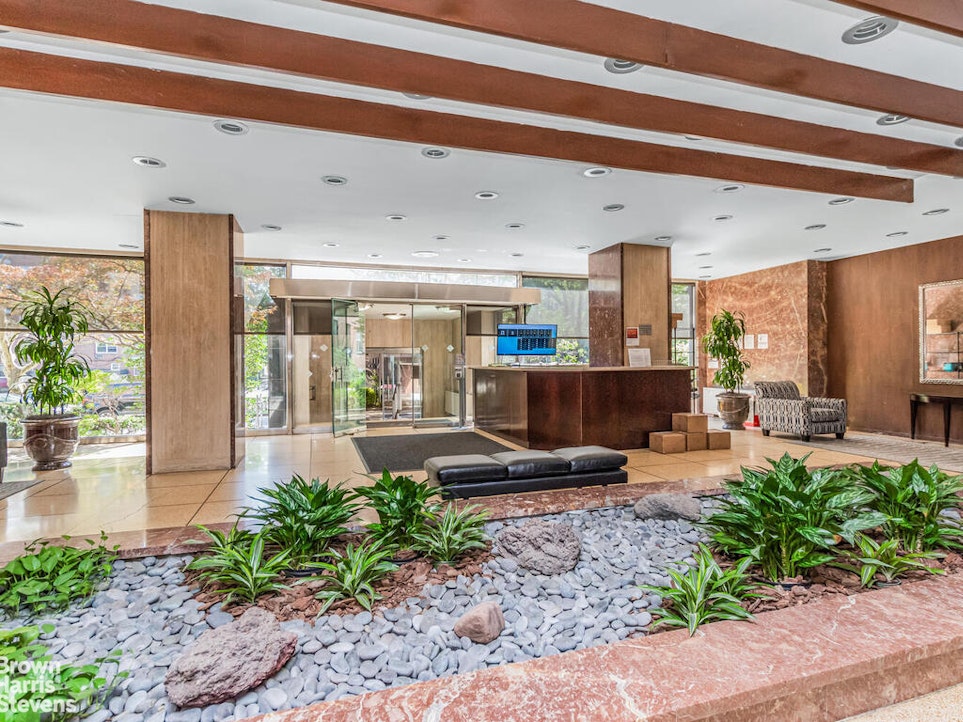 3777 Independence Avenue, Unit 4D Bronx, NY 10463 - Photo 27 of 29 a lobby with furniture and floor to ceiling window