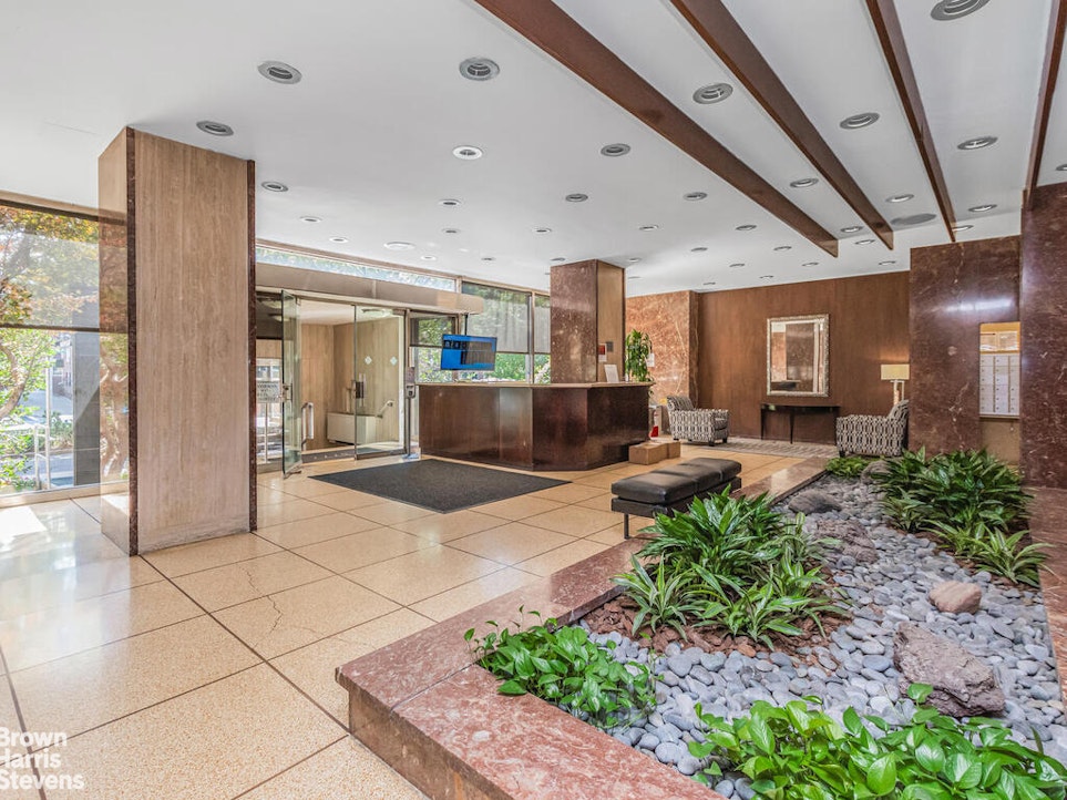 3777 Independence Avenue, Unit 4D Bronx, NY 10463 - Photo 28 of 29 a lobby with furniture and a potted plant