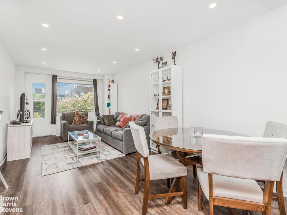 3777 Independence Avenue, Unit 4D Bronx, NY 10463 - Photo 3 of 29 a living room with furniture and a large window