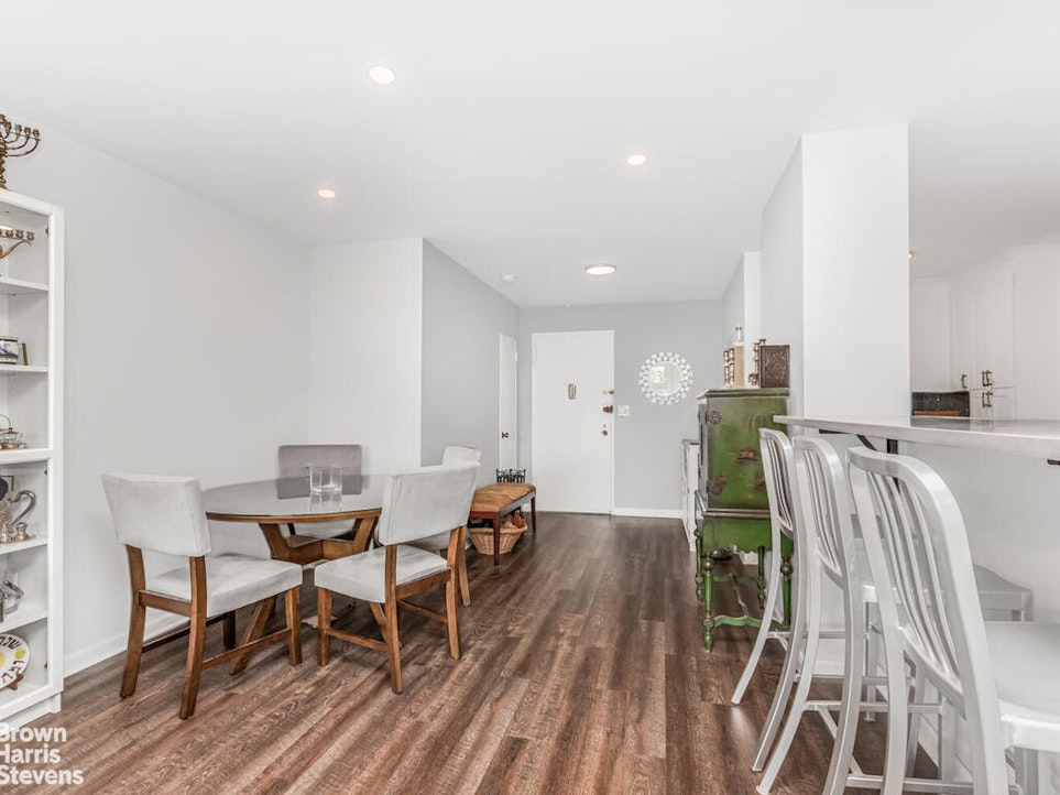 3777 Independence Avenue, Unit 4D Bronx, NY 10463 - Photo 5 of 29 a workspace with furniture and wooden floor