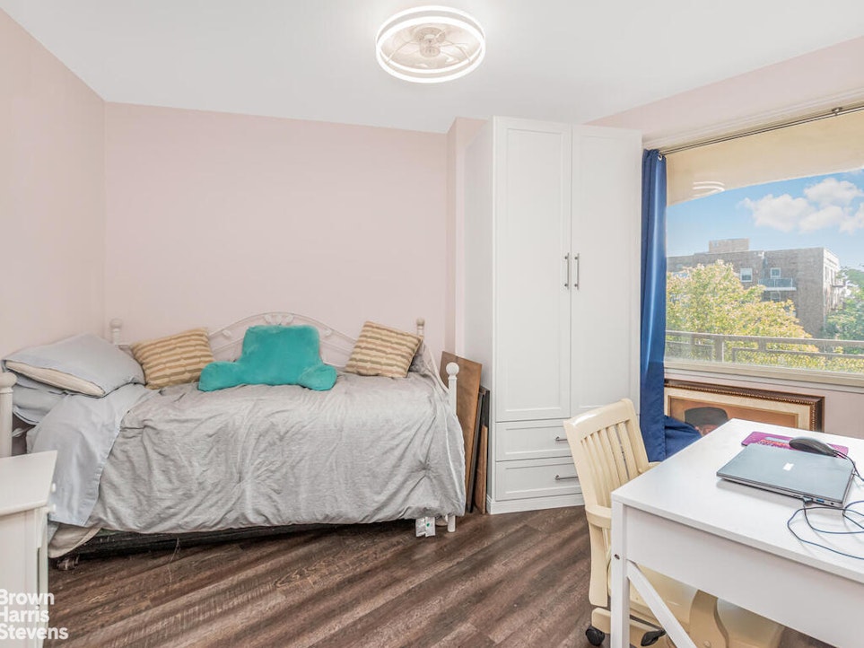 3777 Independence Avenue, Unit 4D Bronx, NY 10463 - Photo 8 of 29 a bedroom with a bed and wooden floor