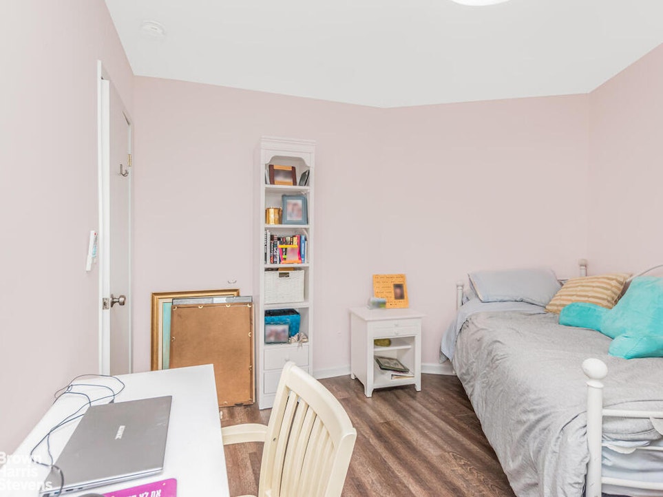 3777 Independence Avenue, Unit 4D Bronx, NY 10463 - Photo 9 of 29 a bedroom with a bed and a couch