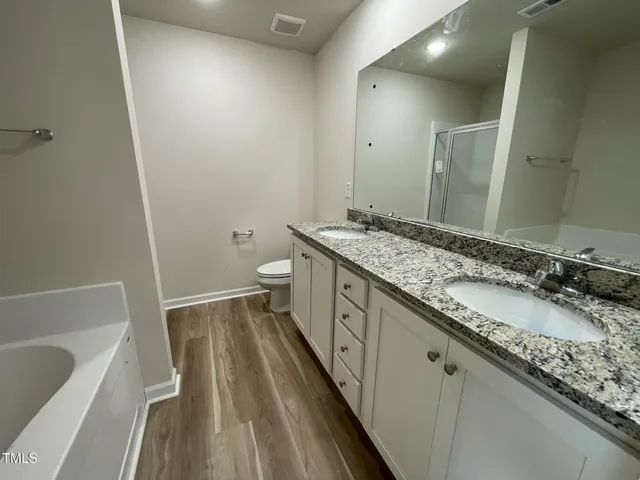 a view of yard with swimming pool and trees