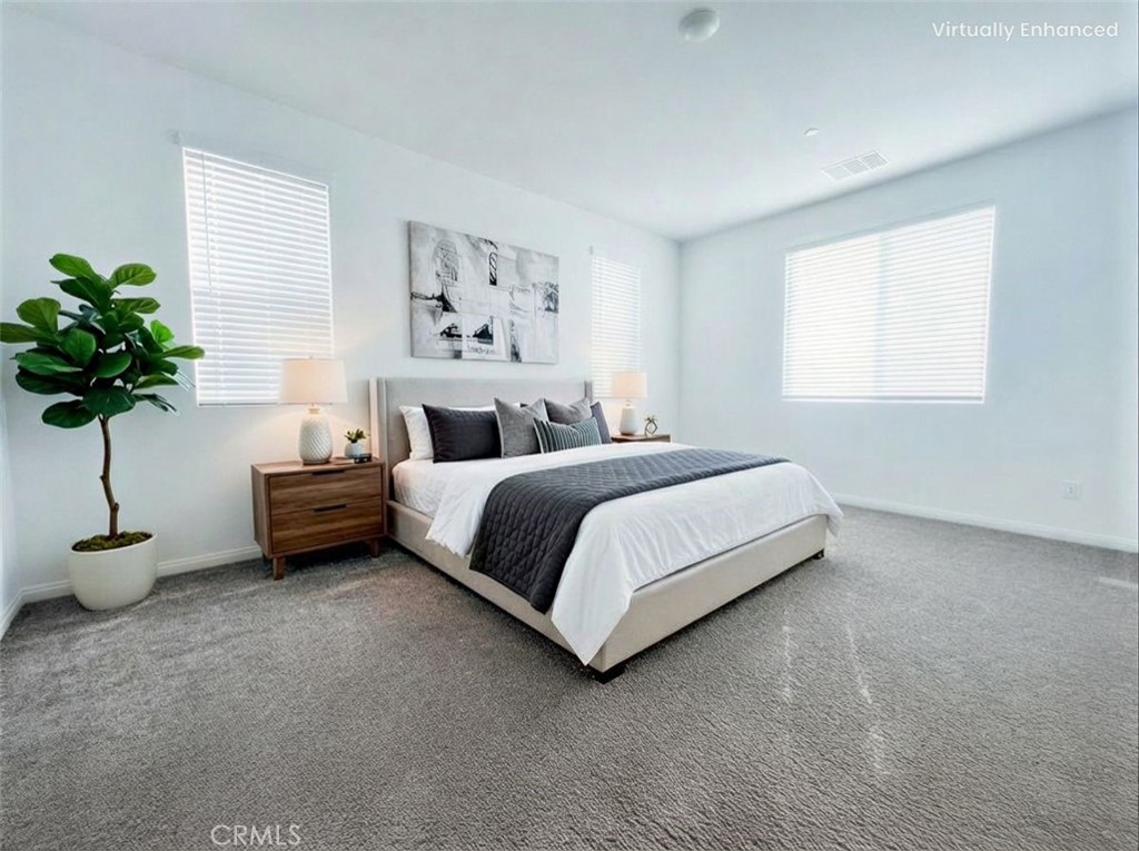16596 Strategy Place Chino, CA 91708 - Photo 6 of 10 a bedroom with a bed and a potted plant