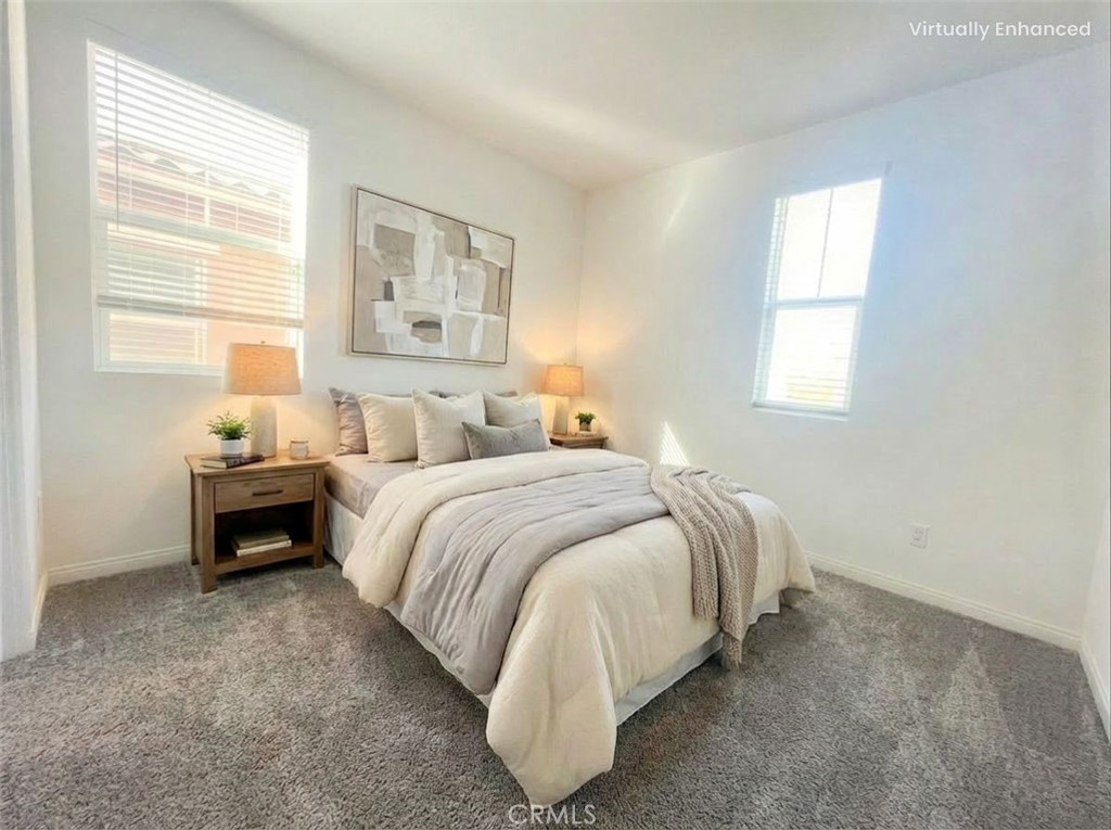 16596 Strategy Place Chino, CA 91708 - Photo 8 of 10 a spacious bedroom with a bed and window